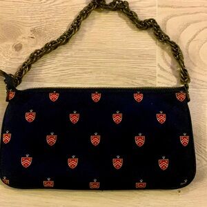 J. Crew Ladies Navy Small Bag (9.5 x 5) with JC Red Crest Scattered on bag.